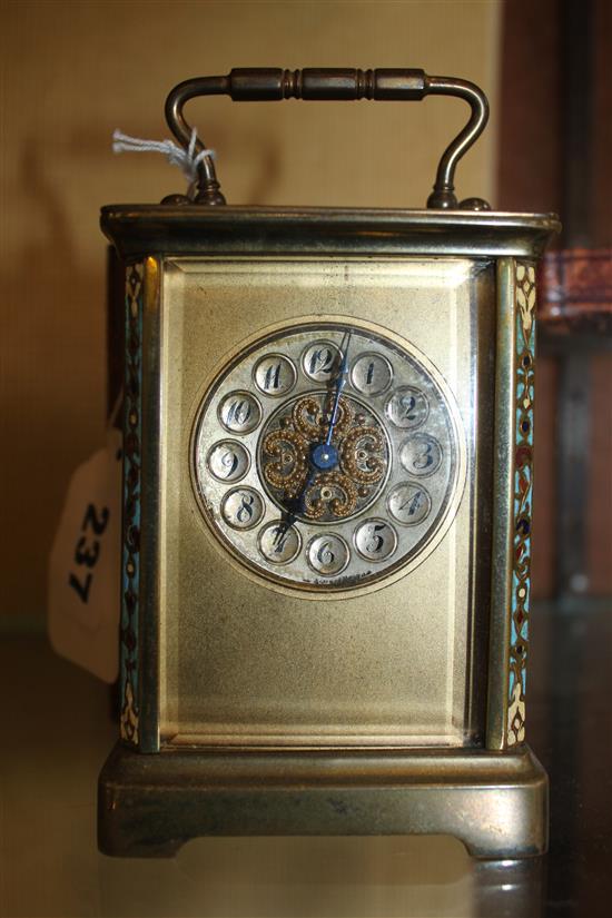 A brass carriage timepiece, cased